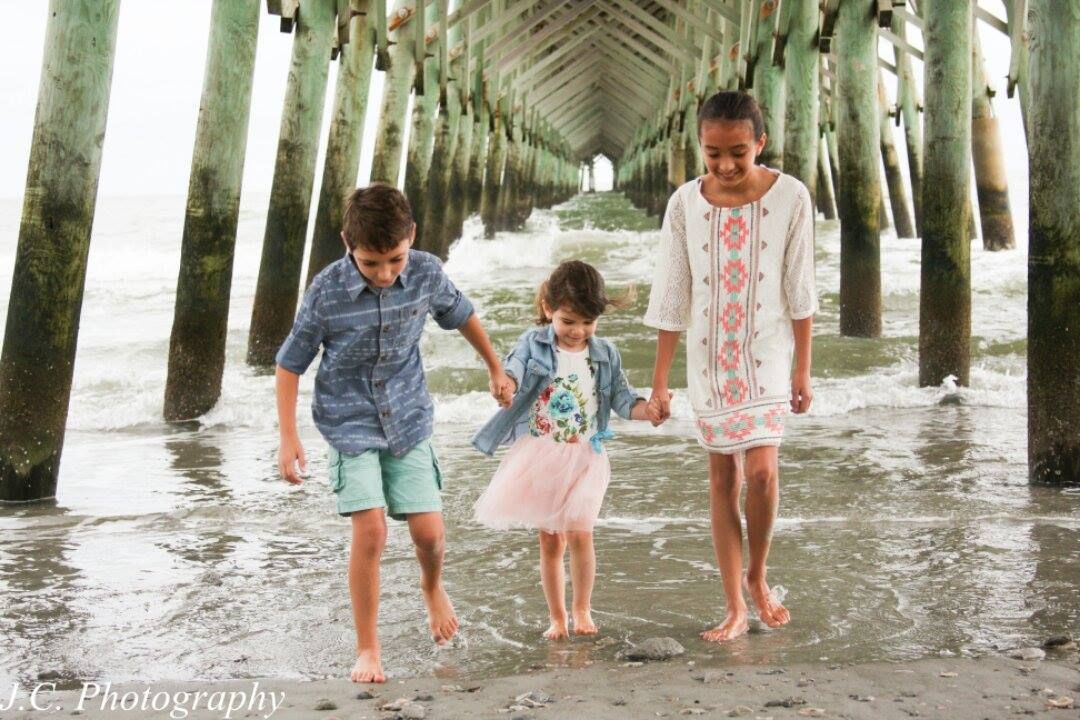 Family Photo Tips from the Pros: Use pastel colors and complimentary patterns for beach wardrobe